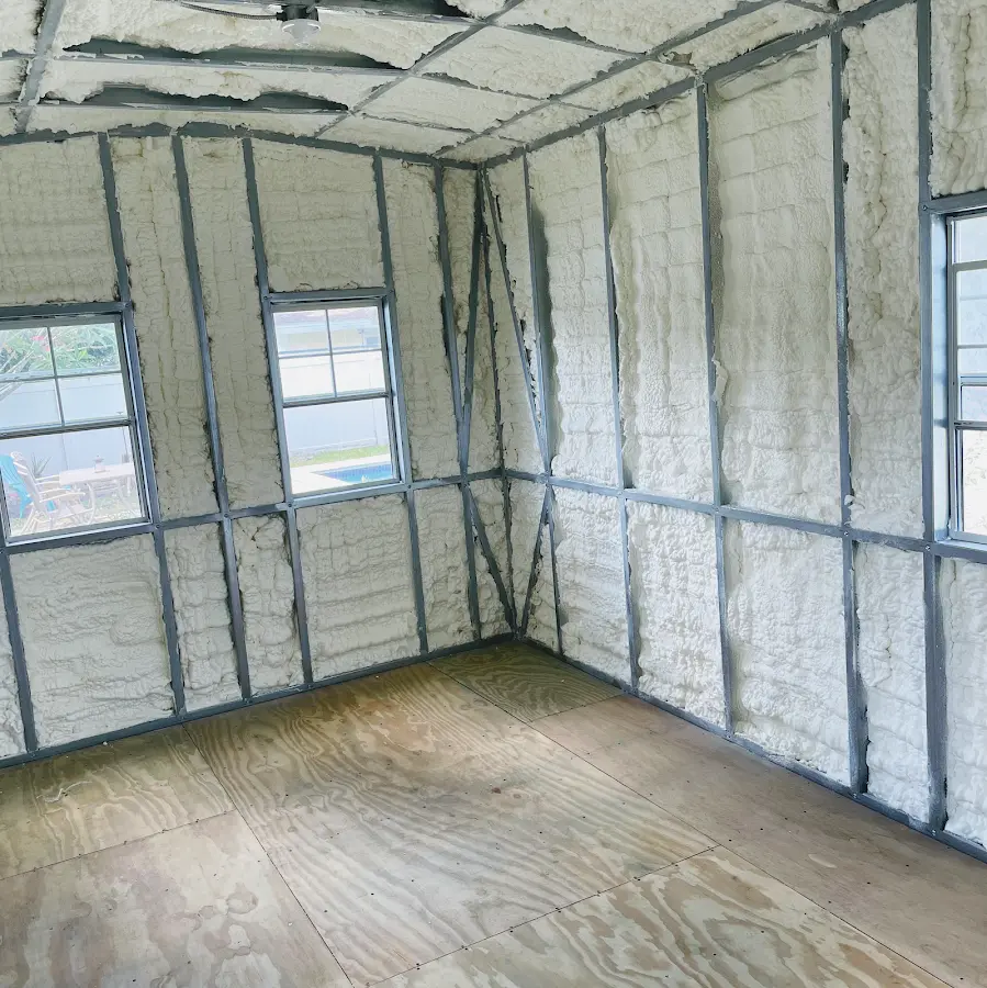 Closed-cell spray foam insulation applied to wall cavities in a residential project in McAllen